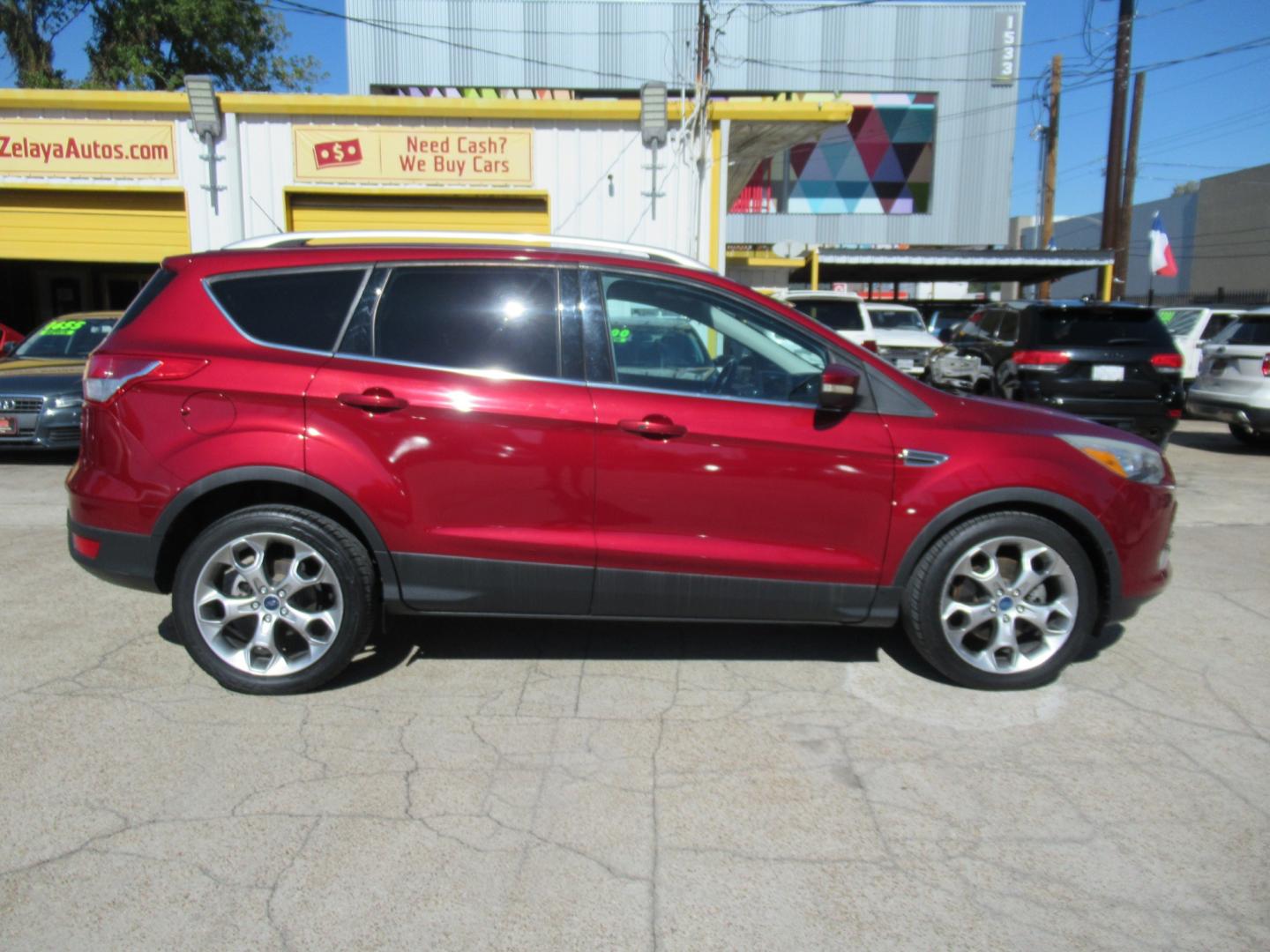 2014 Red /Black Ford Escape Titanium (1FMCU0J98EU) with an 2.0 engine, Automatic transmission, located at 1511 North Shepherd Dr., Houston, TX, 77008, (281) 657-1221, 29.798361, -95.412560 - 2014 FORD ESCAPE TITANIUM VIN: 1FMCU0J98EUA29272 1 F M C U 0 J 9 8 E U A 2 9 2 7 2 4 DOOR WAGON/SPORT UTILITY 2.0L I4 F DOHC 16V GASOLINE FRONT WHEEL DRIVE - Photo#21